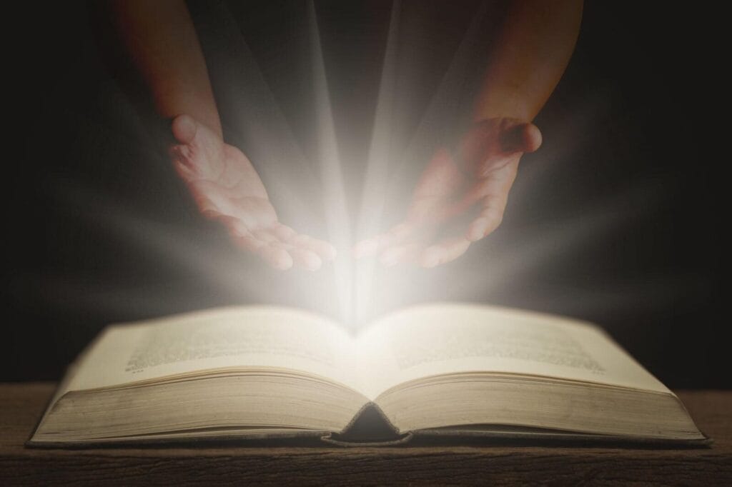 Powerful prayer for financial favor and abundance with open Bible and golden Christian background