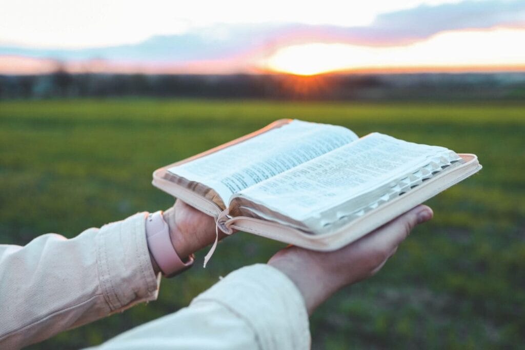 verse of the day john 14:15 devotional with Bible and cross