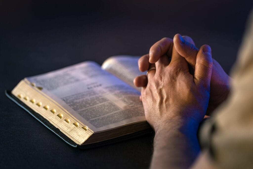 verse of the day john 14:15 devotional with Bible and cross